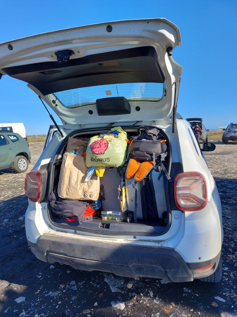 Rental car packed with stuff for road trip in Iceland
